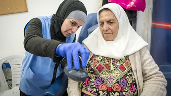 A nurse and a patient discussing in the Diabetes mobile clinic 